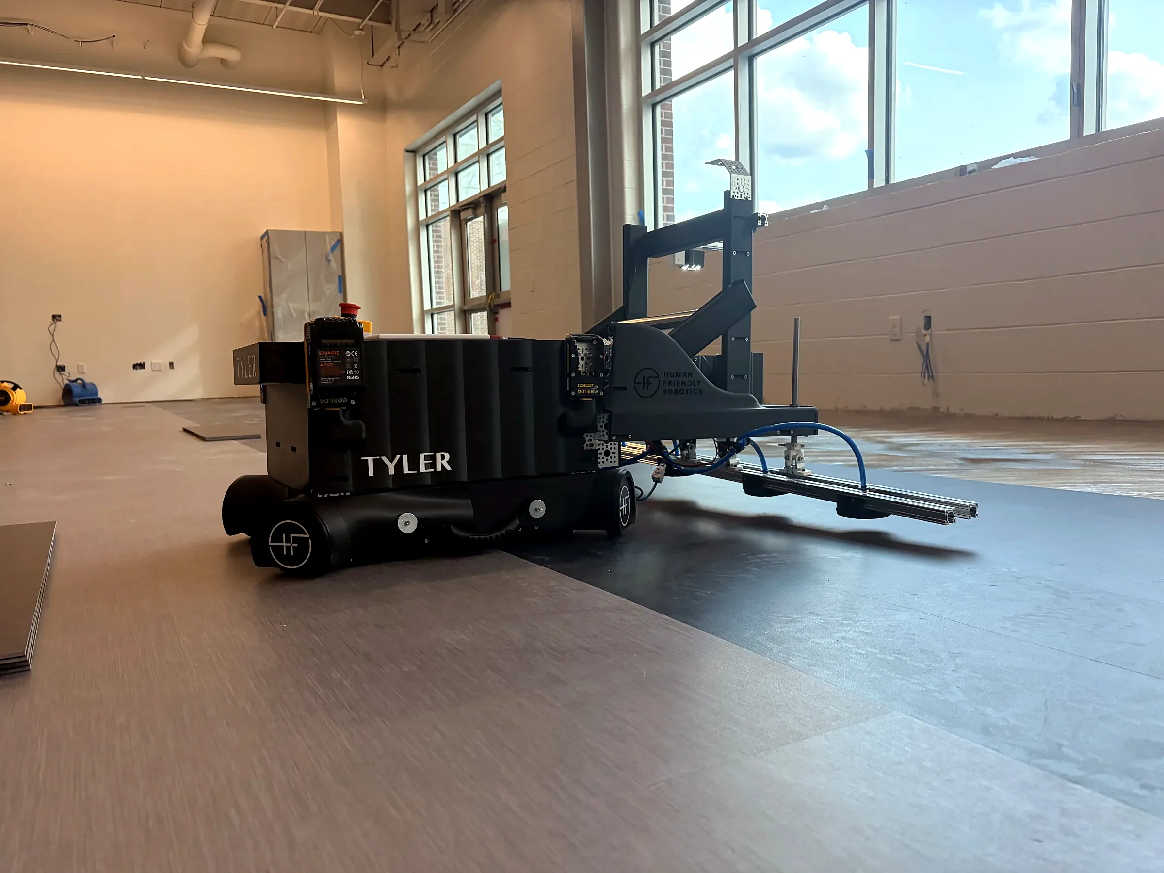 Tyler — tiling robot on a commercial jobsite